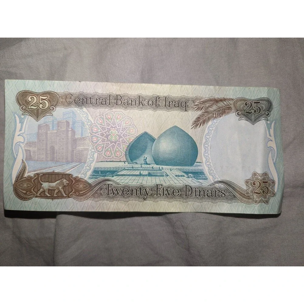 Saddam Hussein real paper money got during the war. Was worth $100 then.